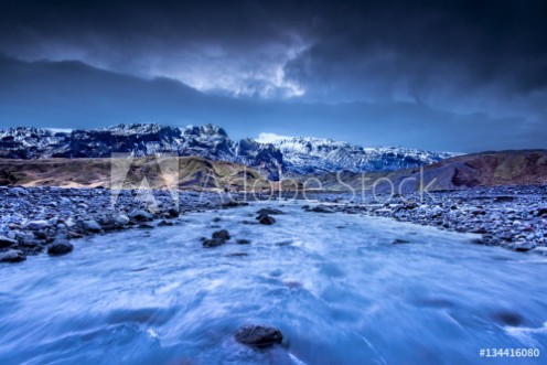 Picture of River flowing through maintain range